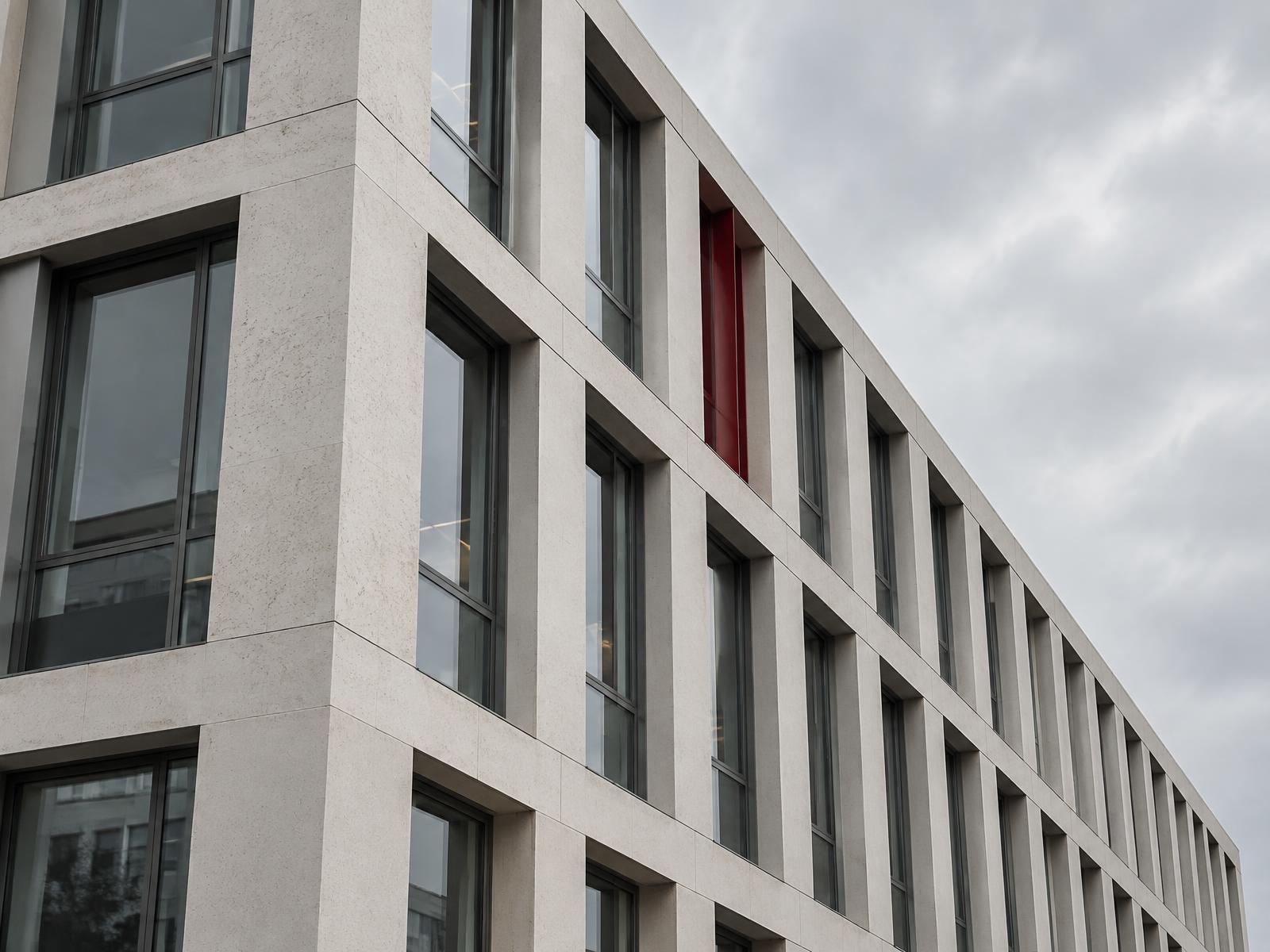 Stone and glass facade of a contemporary building in Geneva
